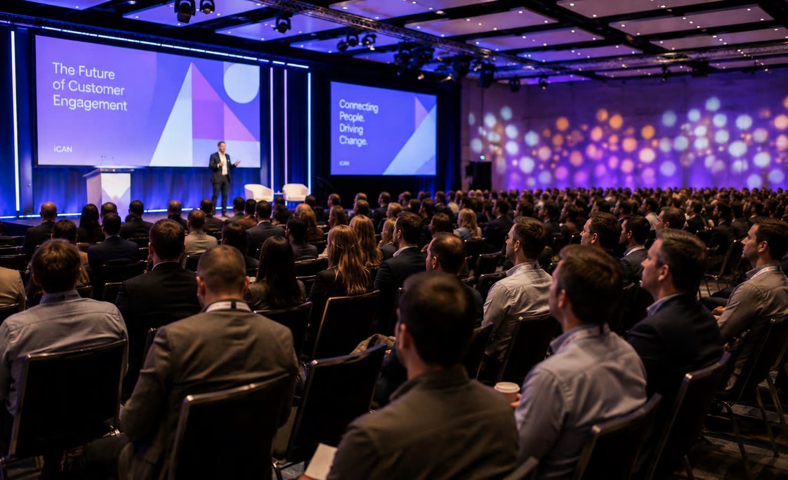Delegates in a conference keynote session