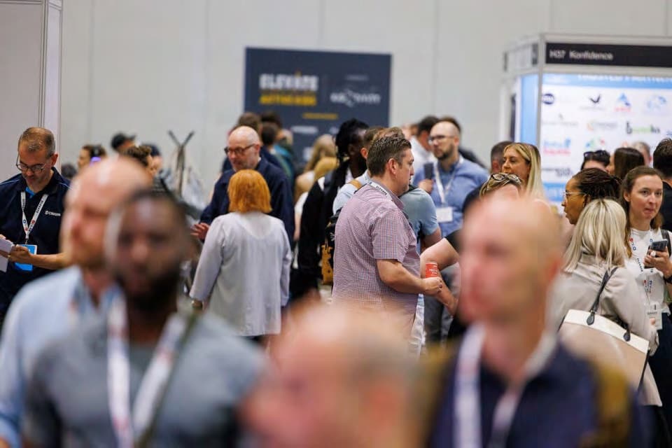 A busy exhibition floor at a conference