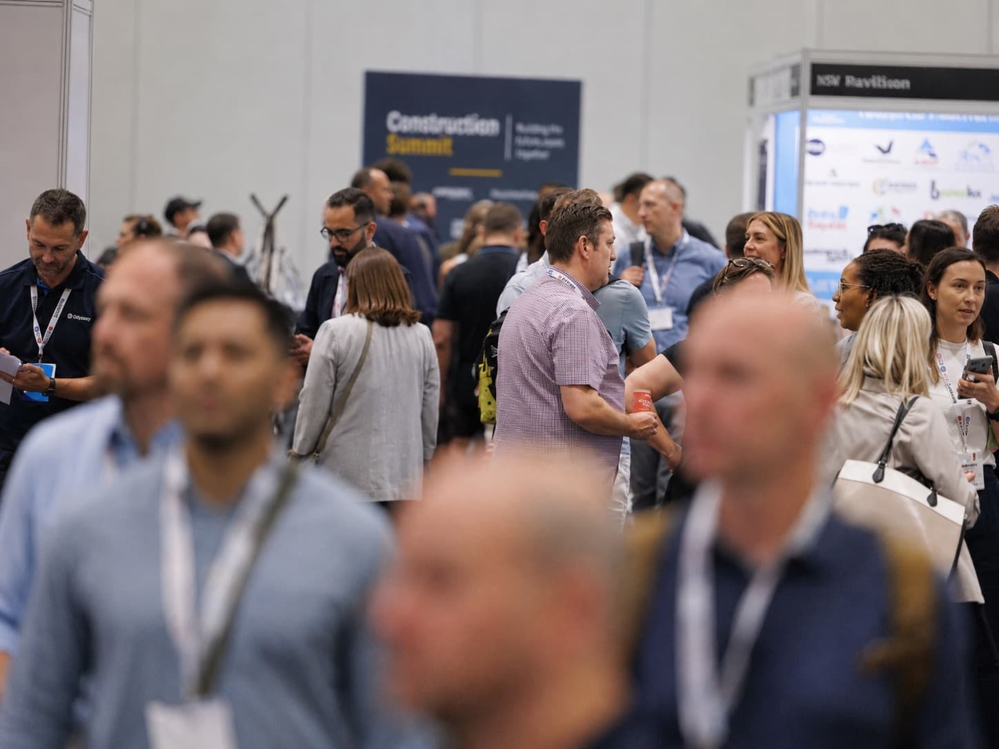A busy exhibition floor at a conference